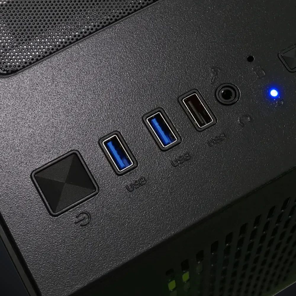 Close-up of the top of the case: power button, USB ports and headphone jack